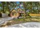 Charming two-story home with a well-maintained lawn and lush landscaping, perfect for curb appeal at 717 E 137Th Ave, Tampa, FL 33613