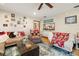 Inviting living room with hardwood floors, comfortable seating, and stylish decor, perfect for relaxation at 717 E 137Th Ave, Tampa, FL 33613