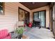 Cozy porch with a barbeque, sliding doors, and comfortable seating area with room for an accent table at 717 E 137Th Ave, Tampa, FL 33613