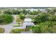 Spacious single-Gathering home surrounded by mature trees, offering a private backyard with a pool and a peaceful neighborhood setting at 7304 Lakeside Blvd, Tampa, FL 33614