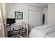 Bedroom with desk, television, closet and a neutral color scheme at 7304 Lakeside Blvd, Tampa, FL 33614