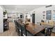 Open-concept dining room provides seamless flow to kitchen and living spaces at 7304 Lakeside Blvd, Tampa, FL 33614