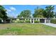 Charming single-story home with a well-maintained lawn and lovely curb appeal at 7304 Lakeside Blvd, Tampa, FL 33614