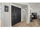 Hallway showcasing wood-look floors and classic decor accents at 7304 Lakeside Blvd, Tampa, FL 33614