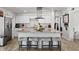 Spacious kitchen with a large island, granite countertops, and stainless-steel appliances at 7304 Lakeside Blvd, Tampa, FL 33614