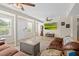 Bright and airy living room with wood-look floors and stylish decor at 7304 Lakeside Blvd, Tampa, FL 33614