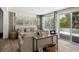 Bright living room featuring sliding glass doors accessing the pool at 7304 Lakeside Blvd, Tampa, FL 33614