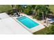 Aerial view of a refreshing private pool and patio area, perfect for outdoor relaxation at 7304 Lakeside Blvd, Tampa, FL 33614
