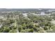 Scenic aerial view of a neighborhood surrounded by lush greenery and waterways at 7347 Pulsar St, New Port Richey, FL 34652