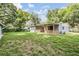Wide backyard featuring a covered patio at 7347 Pulsar St, New Port Richey, FL 34652