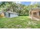 Spacious backyard with lush greenery at 7347 Pulsar St, New Port Richey, FL 34652