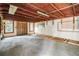 Spacious unfinished basement with concrete floor at 7347 Pulsar St, New Port Richey, FL 34652
