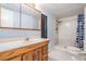Full bathroom featuring a vanity and shower at 7347 Pulsar St, New Port Richey, FL 34652