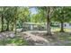 Cozy single-story home with large trees offering lots of shade in yard at 7347 Pulsar St, New Port Richey, FL 34652