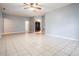 Spacious living room featuring tile flooring and neutral paint at 7347 Pulsar St, New Port Richey, FL 34652