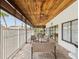 Enjoy outdoor living on the covered patio with comfortable seating at 7360 Ulmerton Rd # 18A, Largo, FL 33771