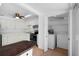 Kitchen view showcases laundry area with modern washer and dryer, complementing the functional design at 8020 24Th Ave N, St Petersburg, FL 33710