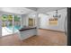 Bright, airy dining space with views of the pool, perfect for entertaining at 8020 24Th Ave N, St Petersburg, FL 33710