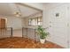 Entryway featuring a tiled floor, interior view to the living room and front door at 8020 28Th N Ave, St Petersburg, FL 33710