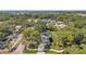Aerial view of home with mature trees, manicured lawn, and modern architectural details at 8095 35Th Ave N, St Petersburg, FL 33710
