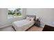 Comfortable bedroom with bright window and light gray walls at 8095 35Th Ave N, St Petersburg, FL 33710