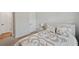 Comfortable bedroom with neutral decor, soft carpet, and access to hallway and closet at 8095 35Th Ave N, St Petersburg, FL 33710