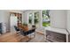 Dining room featuring wood floors, table with seating for four, and a built in bookshelf at 8095 35Th Ave N, St Petersburg, FL 33710