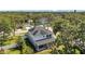 Two-story home featuring solar panels and a well-manicured lawn at 8095 35Th Ave N, St Petersburg, FL 33710