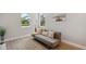 Inviting living room with wood floors, modern furniture, and natural light from the windows at 8095 35Th Ave N, St Petersburg, FL 33710