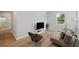 Cozy living room featuring modern furniture, a media center, and plenty of natural light at 8095 35Th Ave N, St Petersburg, FL 33710