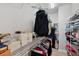 Well-organized walk-in closet providing lots of functional storage space at 8095 35Th Ave N, St Petersburg, FL 33710