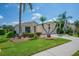 Charming single-story home with well-maintained landscaping and a neatly manicured green lawn at 8223 Haven Harbour Way, Bradenton, FL 34212