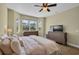 Cozy main bedroom with large windows and plenty of natural light at 8223 Haven Harbour Way, Bradenton, FL 34212