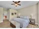 Inviting main bedroom with wood-look flooring and neutral décor at 8223 Haven Harbour Way, Bradenton, FL 34212