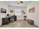 Functional office space with modern desk and neutral decor and flooring at 8223 Haven Harbour Way, Bradenton, FL 34212