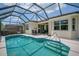 Enjoy a private, screened-in pool with a spacious deck and plenty of room for outdoor seating at 8223 Haven Harbour Way, Bradenton, FL 34212