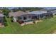 A beautiful screened-in pool area with a well maintained backyard is perfect for enjoying the outdoors at 8223 Haven Harbour Way, Bradenton, FL 34212