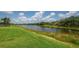 Enjoy the scenic views of the canal from this well maintained lawn, perfect for outdoor activities at 8223 Haven Harbour Way, Bradenton, FL 34212