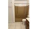 Bathroom with tile flooring, vanity, toilet and shower at 8618 N Orangeview Ave, Tampa, FL 33617