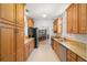 Well-equipped kitchen featuring granite countertops and stainless steel appliances at 8708 Laurel N Dr, Pinellas Park, FL 33782