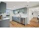 Bright and modern kitchen with stainless steel appliances, sleek cabinets, and updated finishes at 909 E 28Th Ave, Tampa, FL 33605