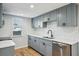 Modern kitchen boasting stainless steel appliances, white subway tile backsplash, and sleek countertops at 909 E 28Th Ave, Tampa, FL 33605