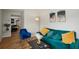 Bright living room with hardwood flooring and colorful contemporary furniture at 909 E 28Th Ave, Tampa, FL 33605