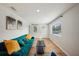 Inviting living room with hardwood floors, contemporary furniture, and natural light at 909 E 28Th Ave, Tampa, FL 33605