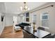 Open-concept space features the living and dining area, highlighted by stylish decor at 909 E 28Th Ave, Tampa, FL 33605