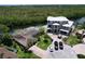 Stunning waterfront homes with a beautiful pool and lush landscaping nestled on a peninsula at 9631 Oak Ne St, St Petersburg, FL 33702