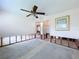 Bedroom with open access to other rooms, and a ceiling fan at 9631 Oak Ne St, St Petersburg, FL 33702