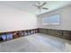 View of a bedroom needing renovation features exposed walls and a window with blinds at 9631 Oak Ne St, St Petersburg, FL 33702