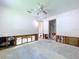 View of a bedroom needing renovation features exposed walls and an open closet and entry way at 9631 Oak Ne St, St Petersburg, FL 33702