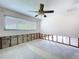 Bright bedroom featuring a ceiling fan and a window for natural light at 9631 Oak Ne St, St Petersburg, FL 33702